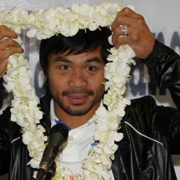 Manny Pacquiao aides accused of attacking photographer
